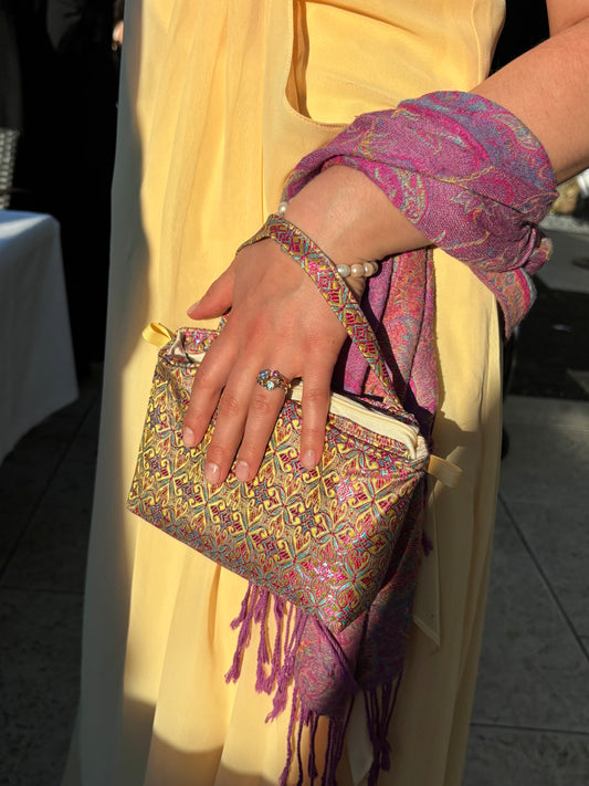 Mini Tasche mit Henkel und Kette